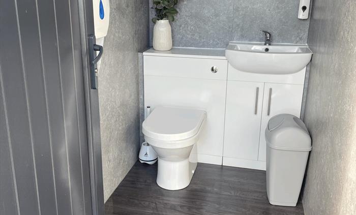 toilet and sink on campsite